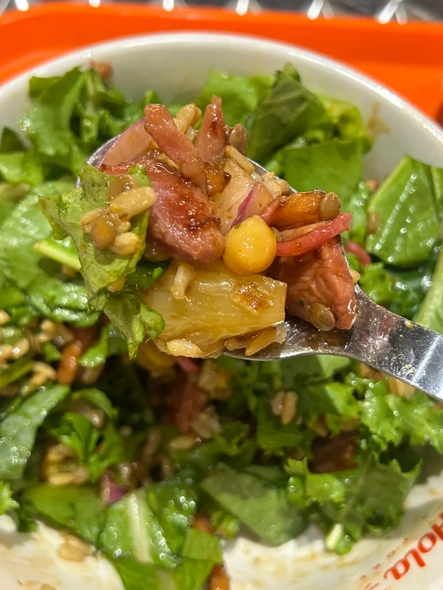 Poke bowl with a half rice, half salad base