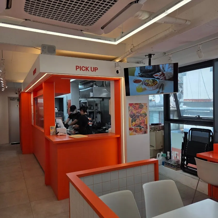 Interior of the store with orange accent details