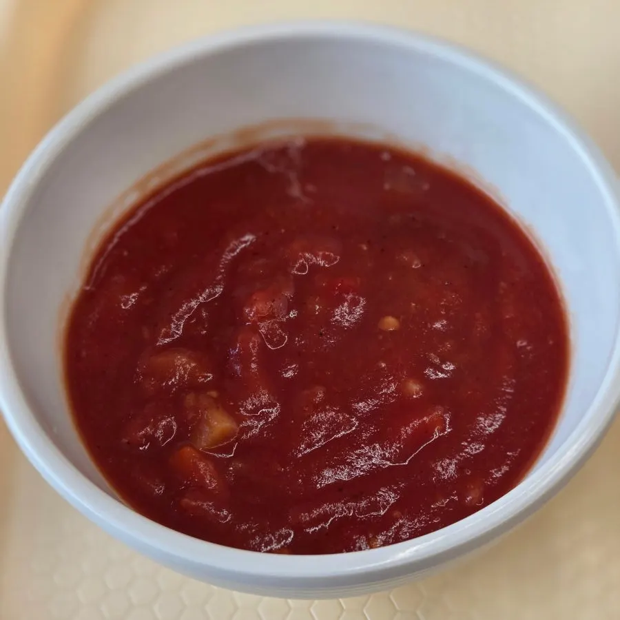 Spicy tomato soup served with the set