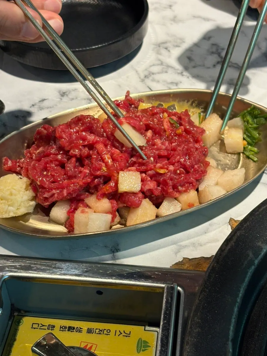 Korean beef yukhoe plate mixed with egg yolk