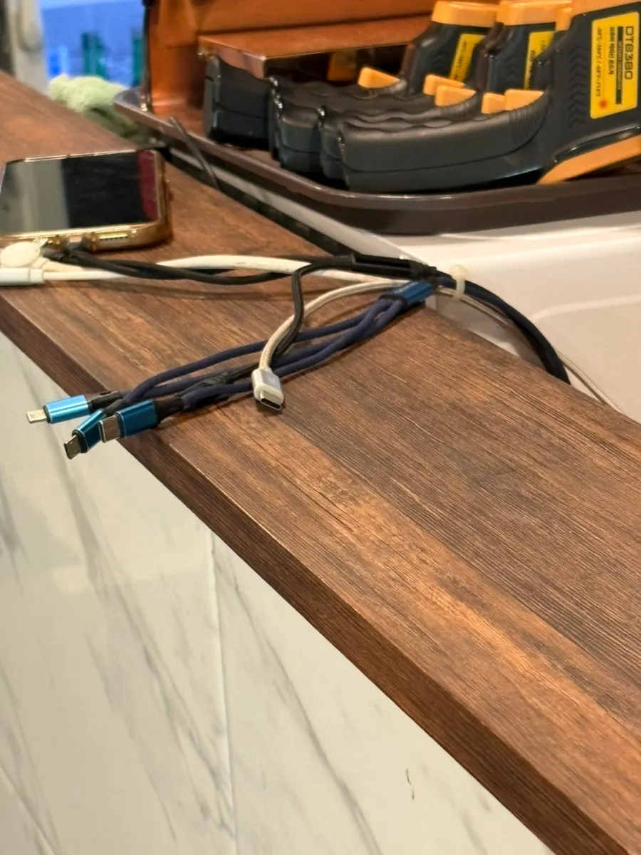 Phone charger at the restaurant counter
