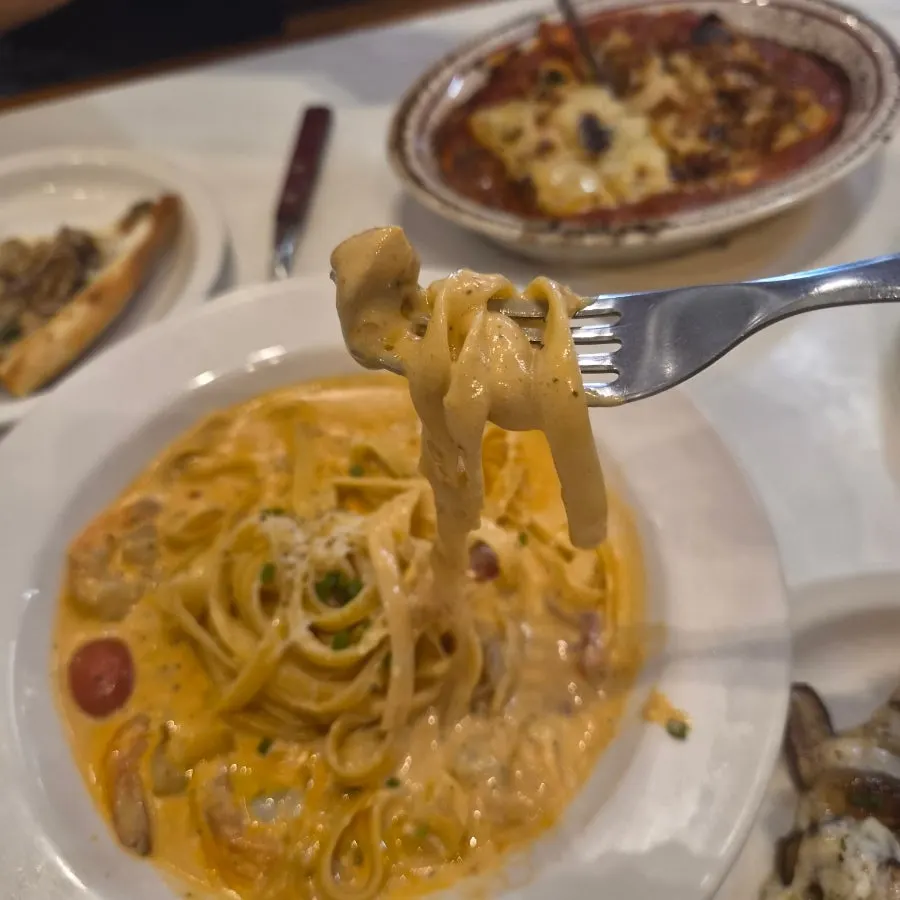 A meal scene with pizza and lasagna together