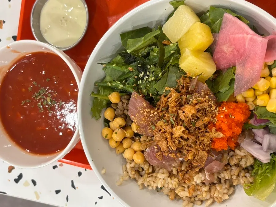 Garlic shrimp poke toppings full of beans, grains, and vegetables