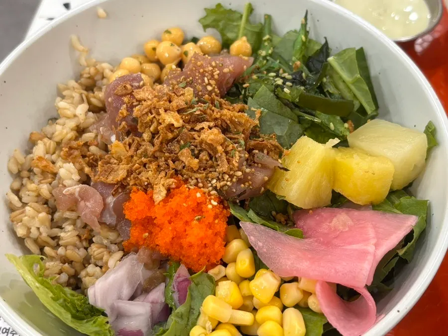 Tuna poke with tuna, flying fish roe, and seaweed