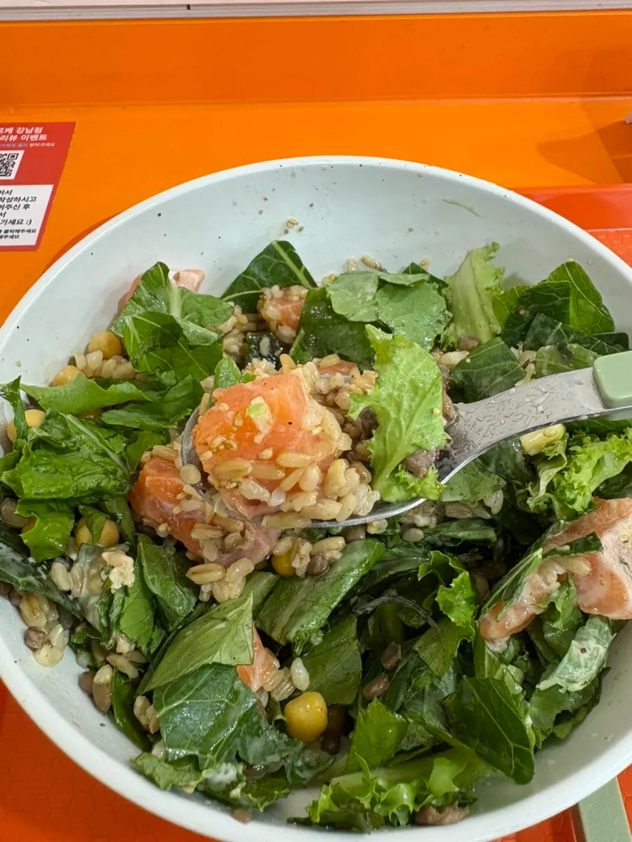A poke bowl loaded with protein toppings