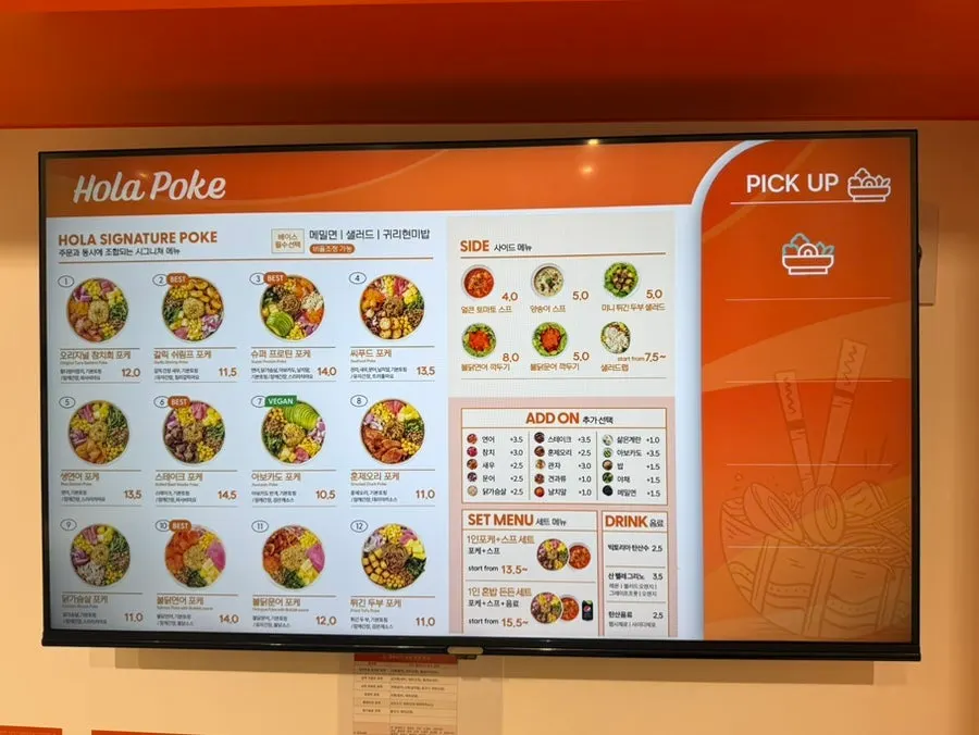 Topping menu board showing raw tuna, salmon, seafood, smoked duck and chicken breast
