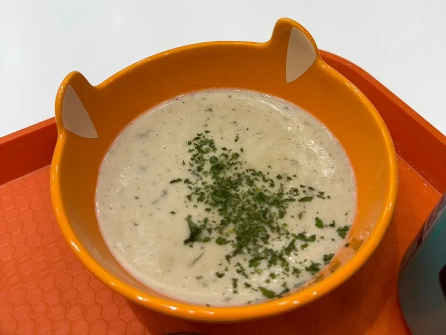 Warm mushroom soup added to the set