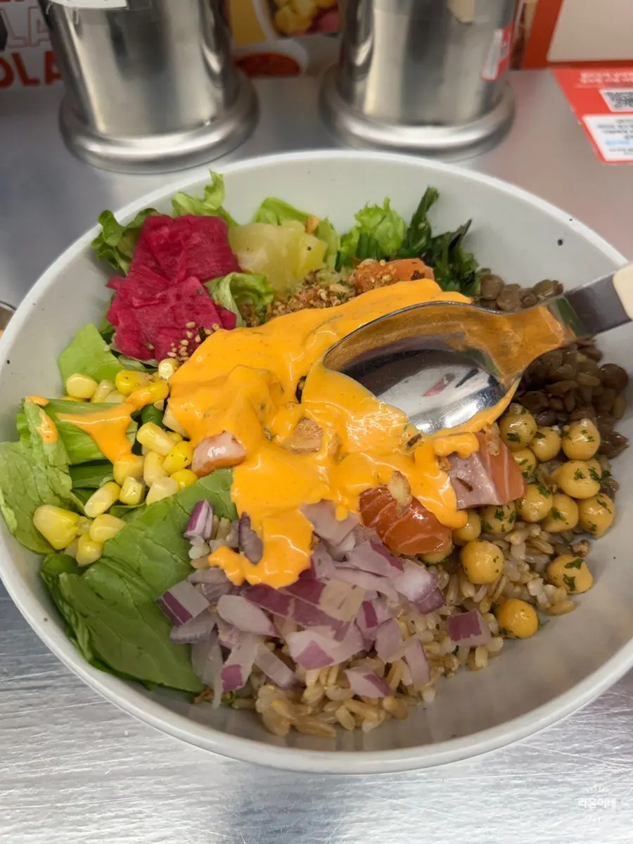 Salmon poke with sriracha mayo poured on top