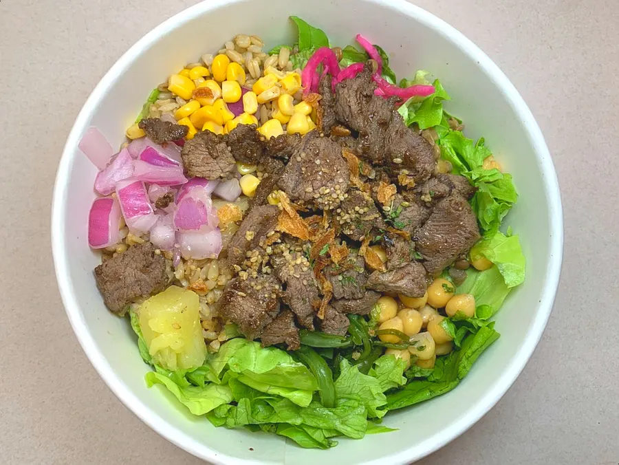 Packed steak poke and sauce for takeout