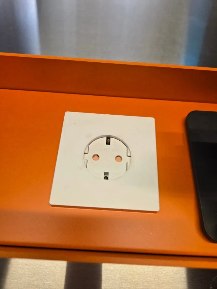 A phone stand placed at every table seat