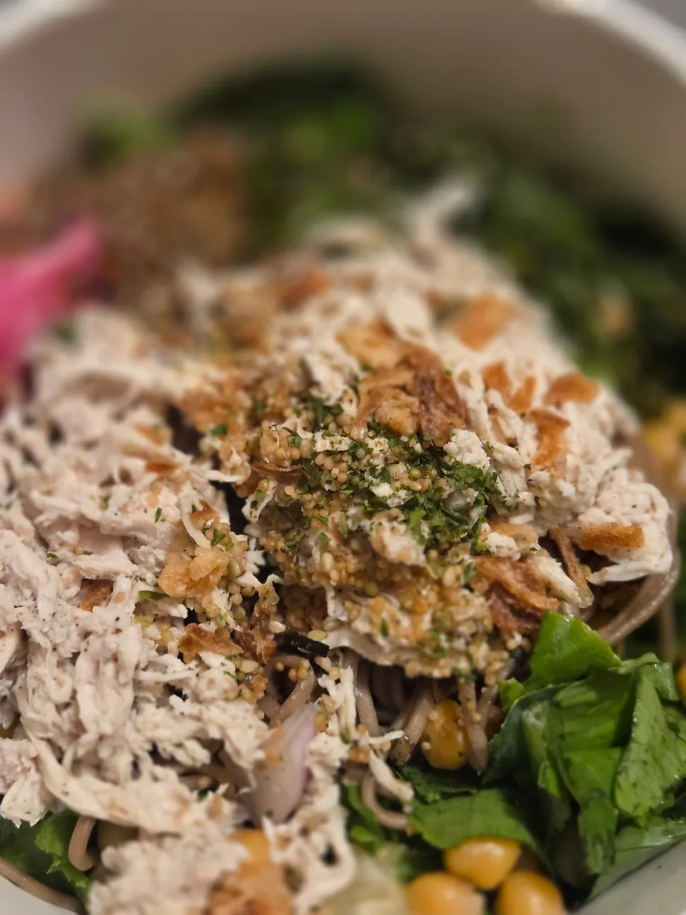 Close-up of chicken breast poke toppings