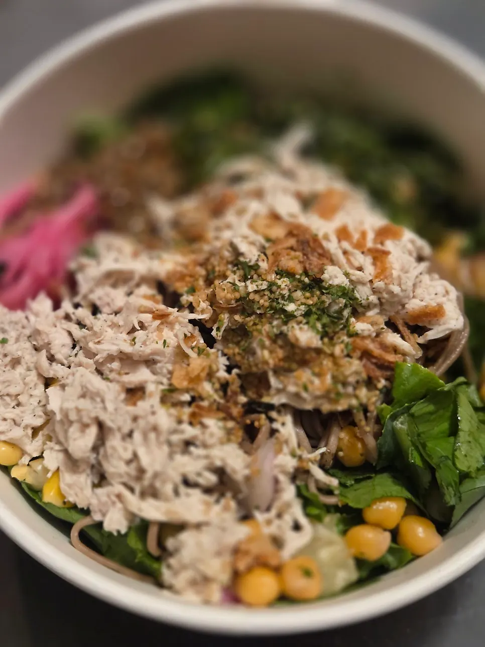 A spoonful of chicken breast poke