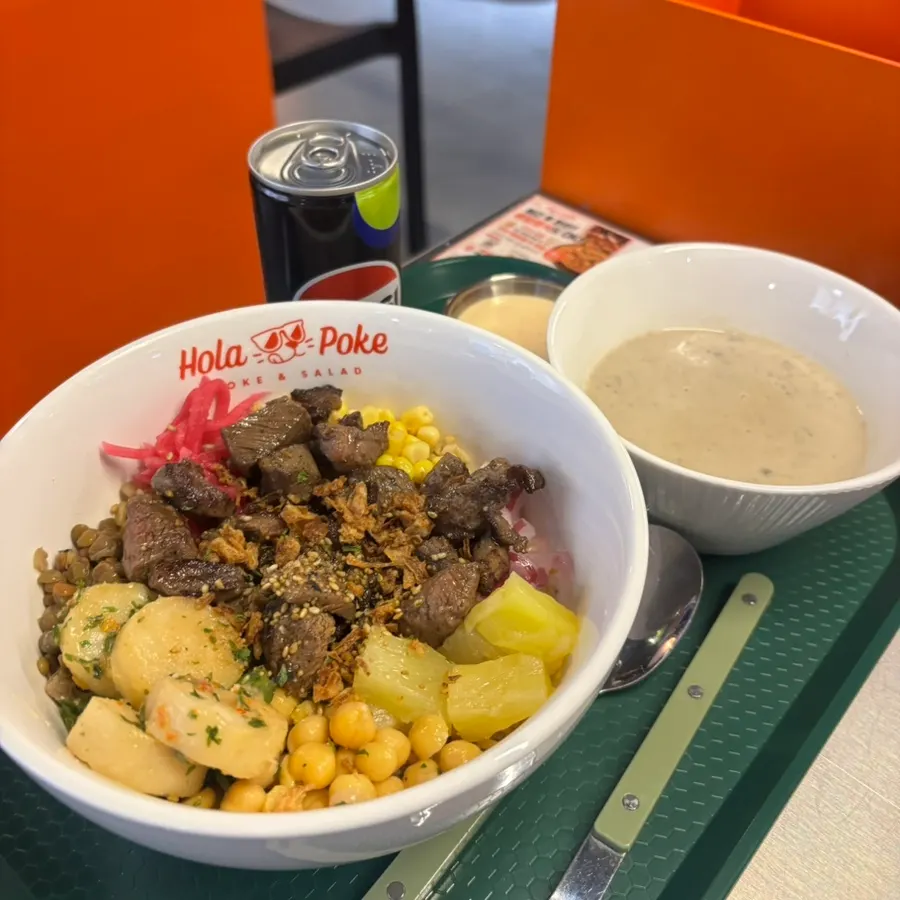 Enjoying a steak poke meal at the solo dining seat
