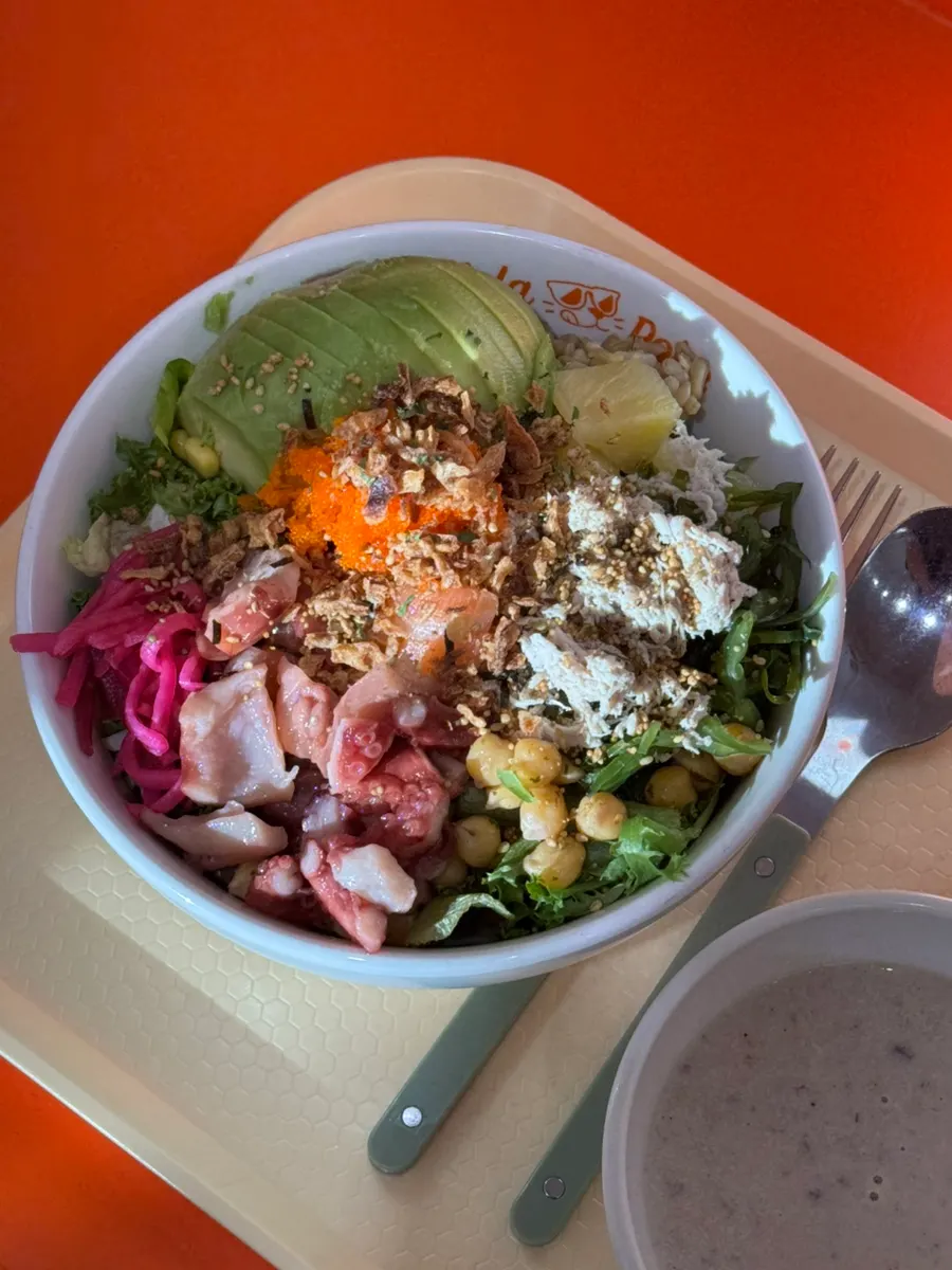 Super Protein poke topped with chicken breast, salmon, and avocado