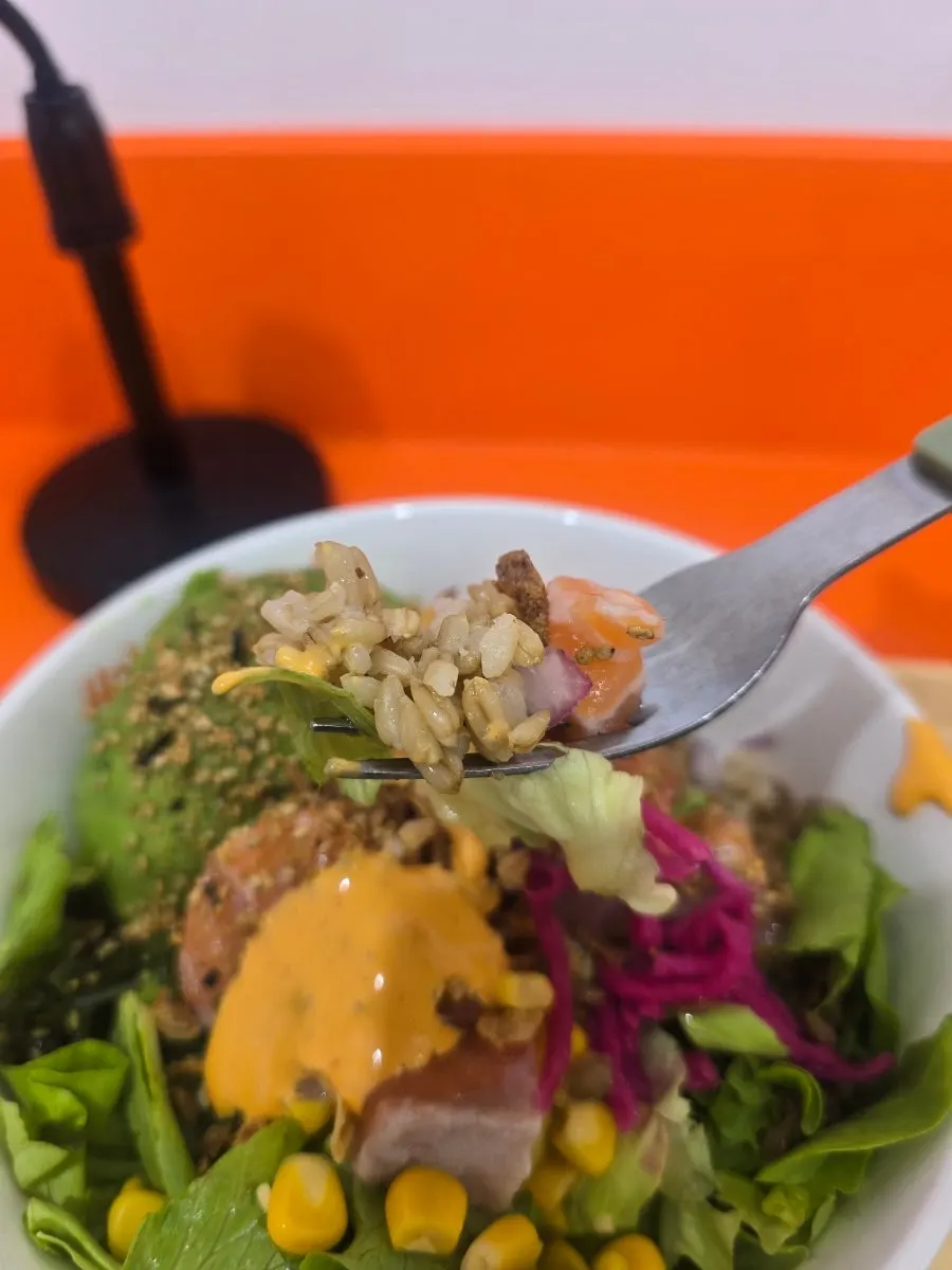 Mid-meal shot of the salmon poke bowl