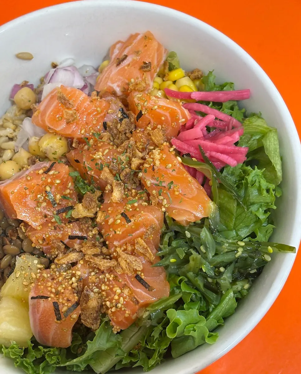 Poke served half salad, half brown rice