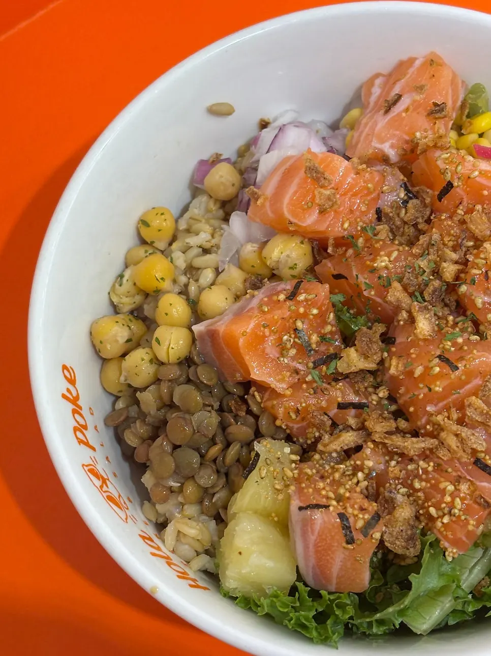 A generously filled bowl of poke