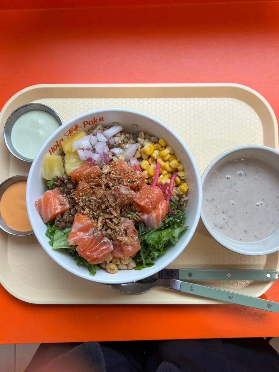 Raw salmon poke and mushroom soup served together