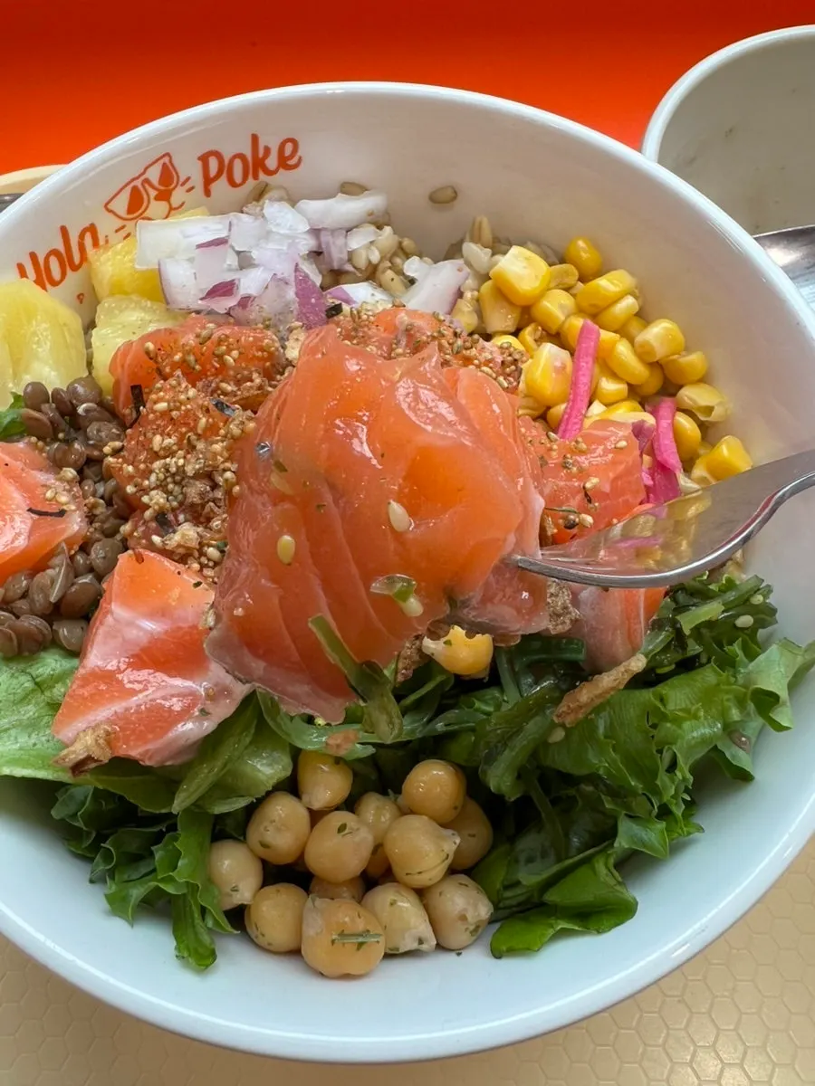 A spoonful of poke lifted up