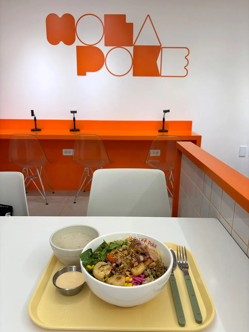 Seafood poke eaten as a diet meal at Hola Poke