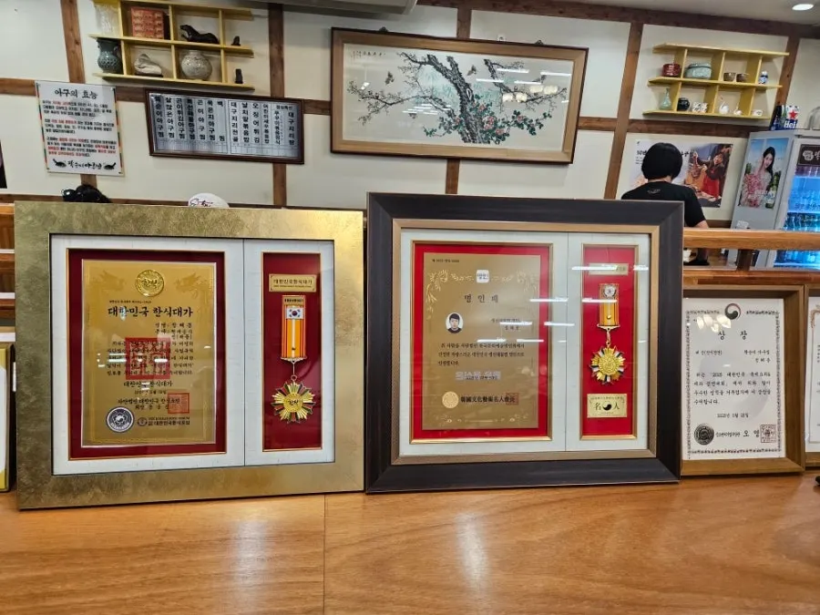 Master craftsman plaque and certificate hanging in the restaurant