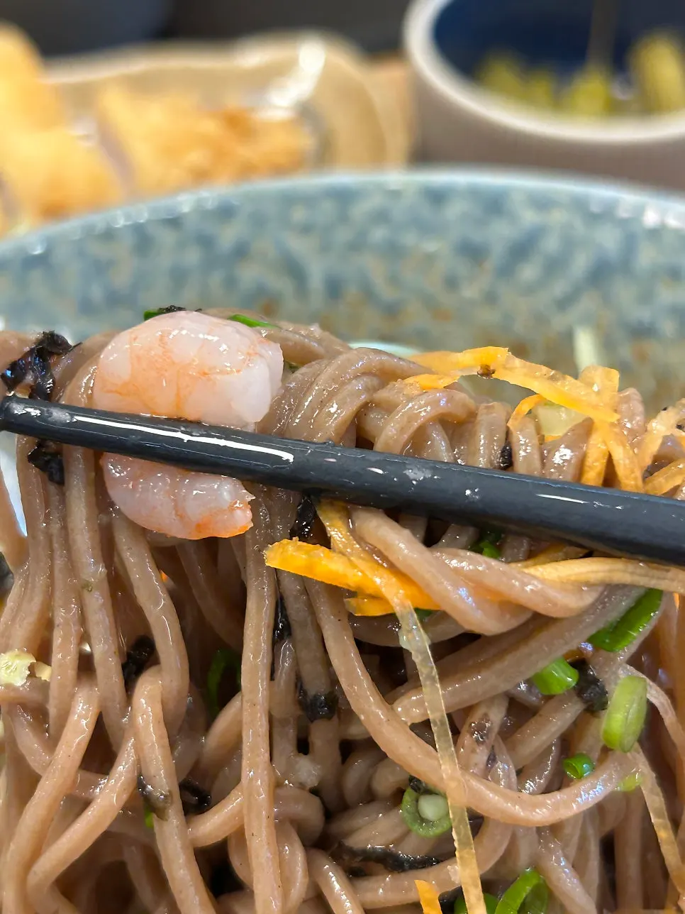 Close-up of springy buckwheat noodles in tsuyu