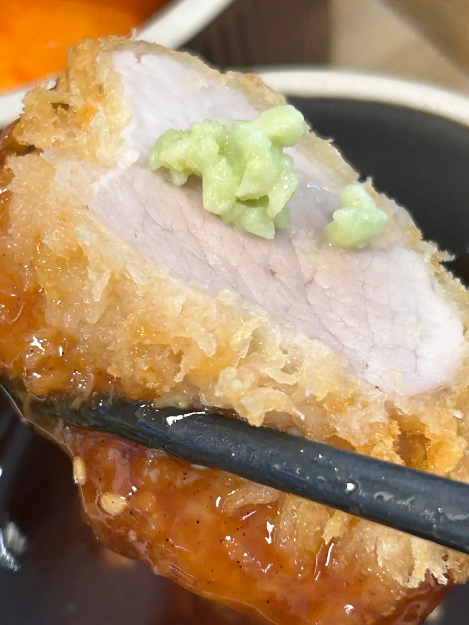 Hire katsu picked up with chopsticks