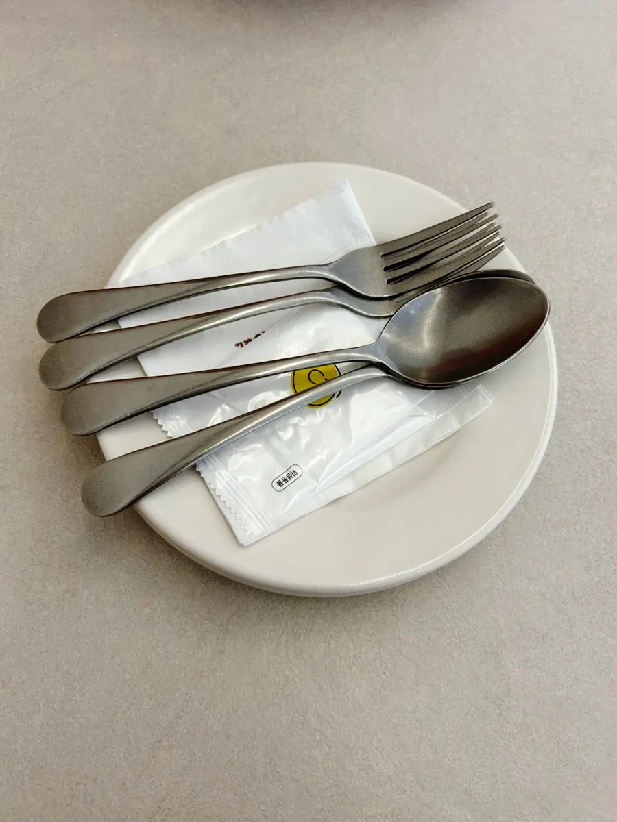 Seating with 2–4 person tables at Omil Hongdae