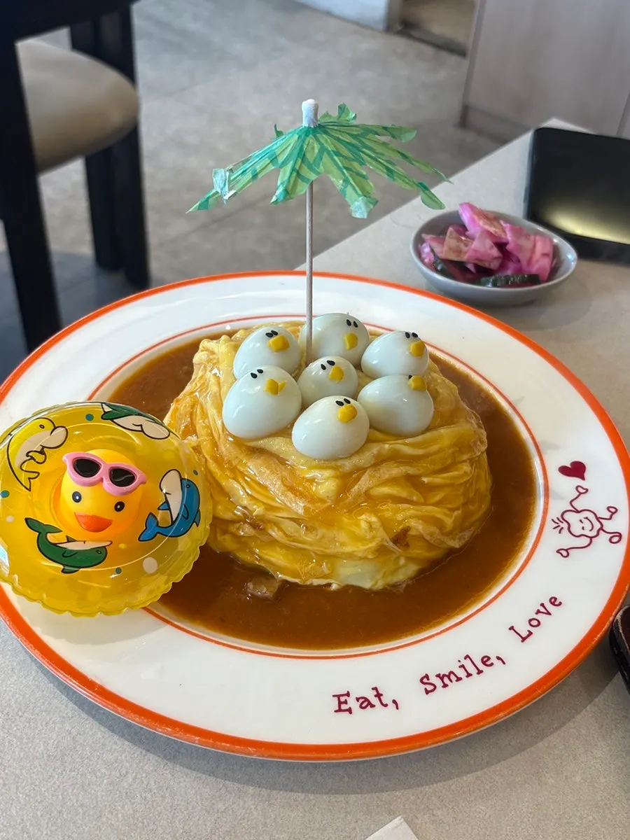 Omil Hongdae's omurice topped with a rubber duck