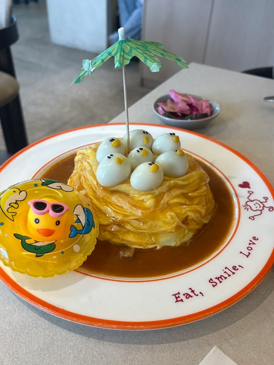 Rubber duck omurice decorated with a mini tube