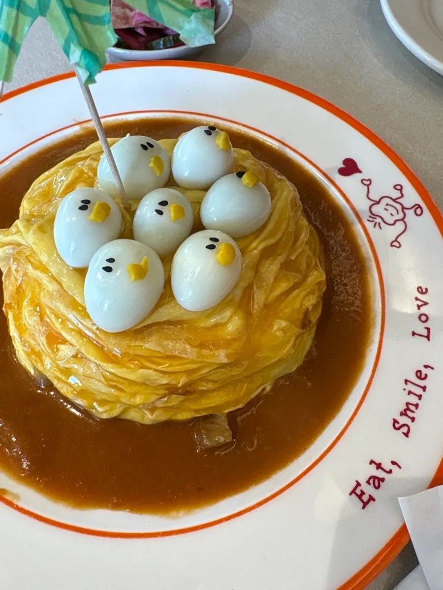 Close-up of the rubber duck omurice on the table