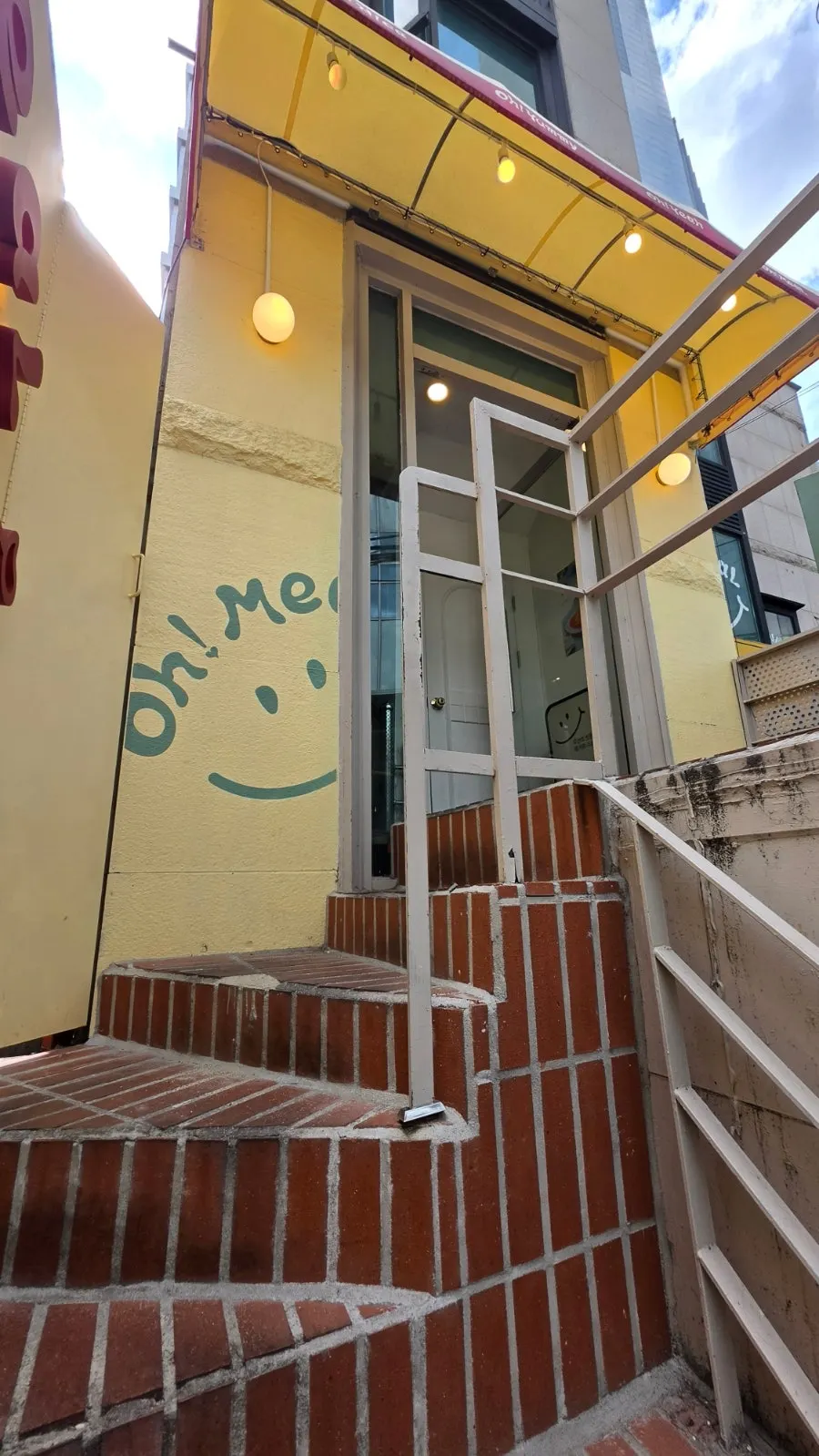 Building facade and sign of Omil Hongdae
