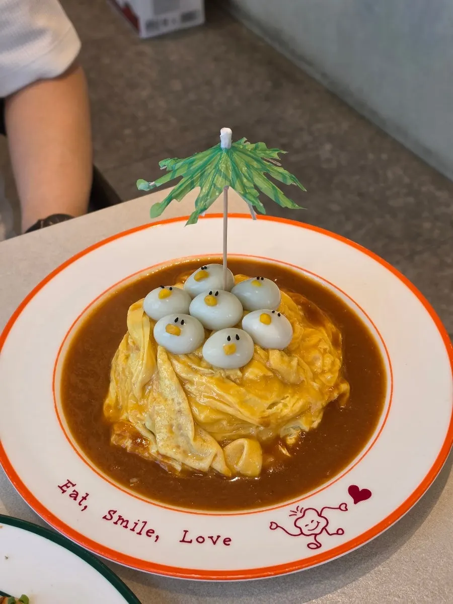 Rubber duck omurice topped with quail egg ducks