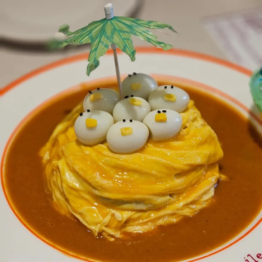 Rubber-duck omurice topped with soft egg