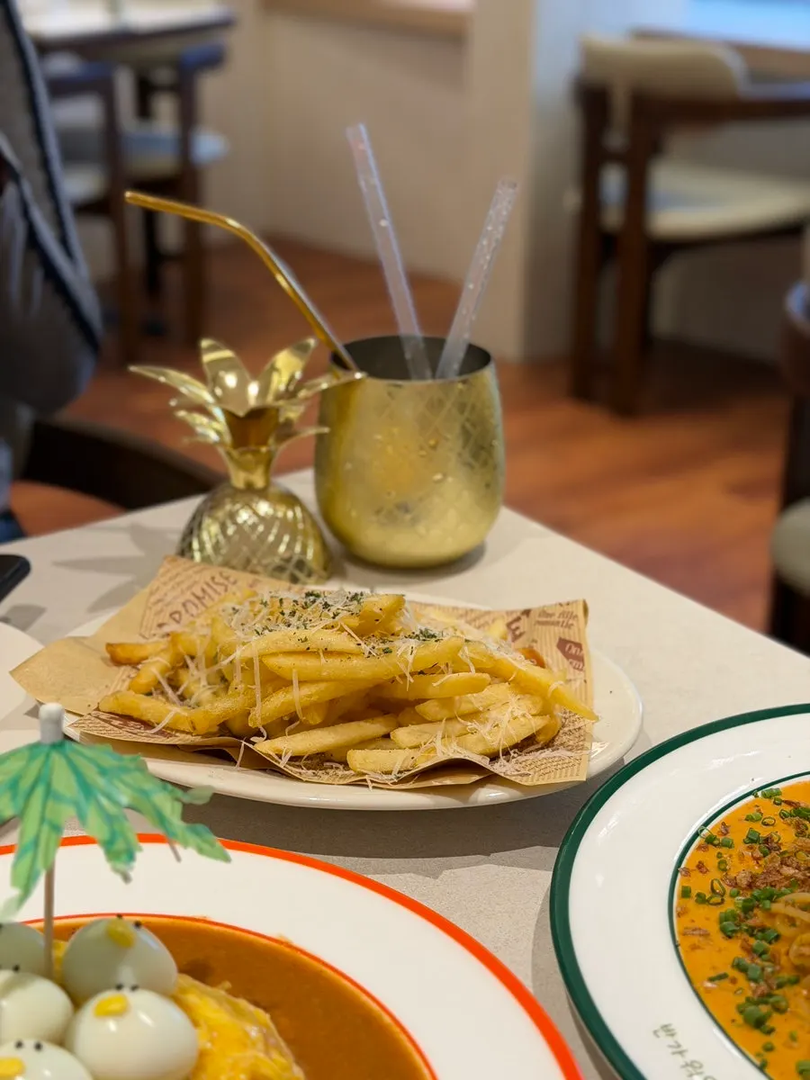 Rubber-duck omurice and pasta spread at Omil Hyehwa Daehangno