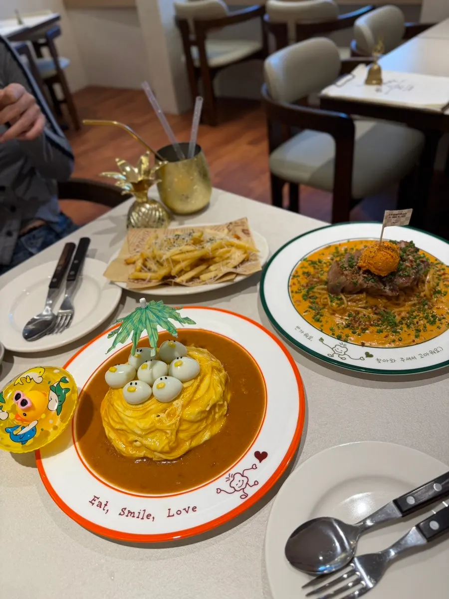 Swirl-style omurice topped with a rubber-duck-shaped quail egg