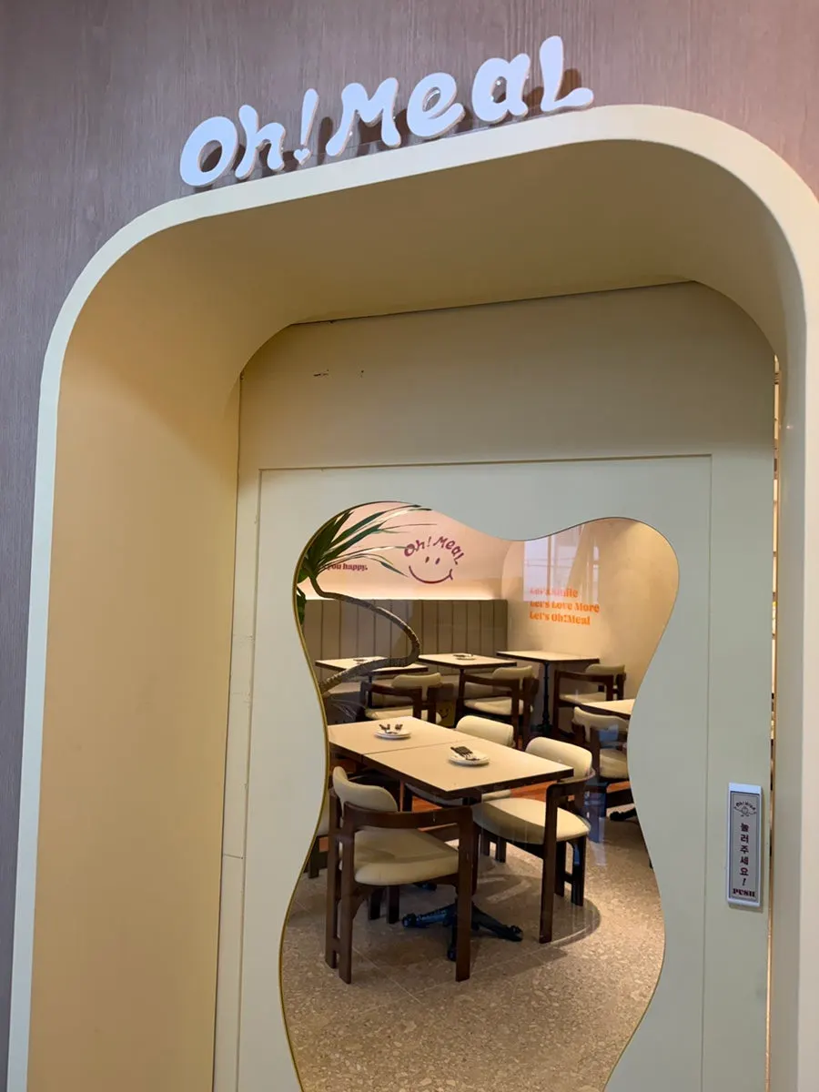 Oh! Meal sign and staircase entrance to the 2nd floor