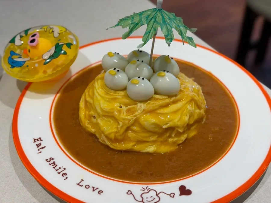 Cross-section of the omurice showing salmon fried rice