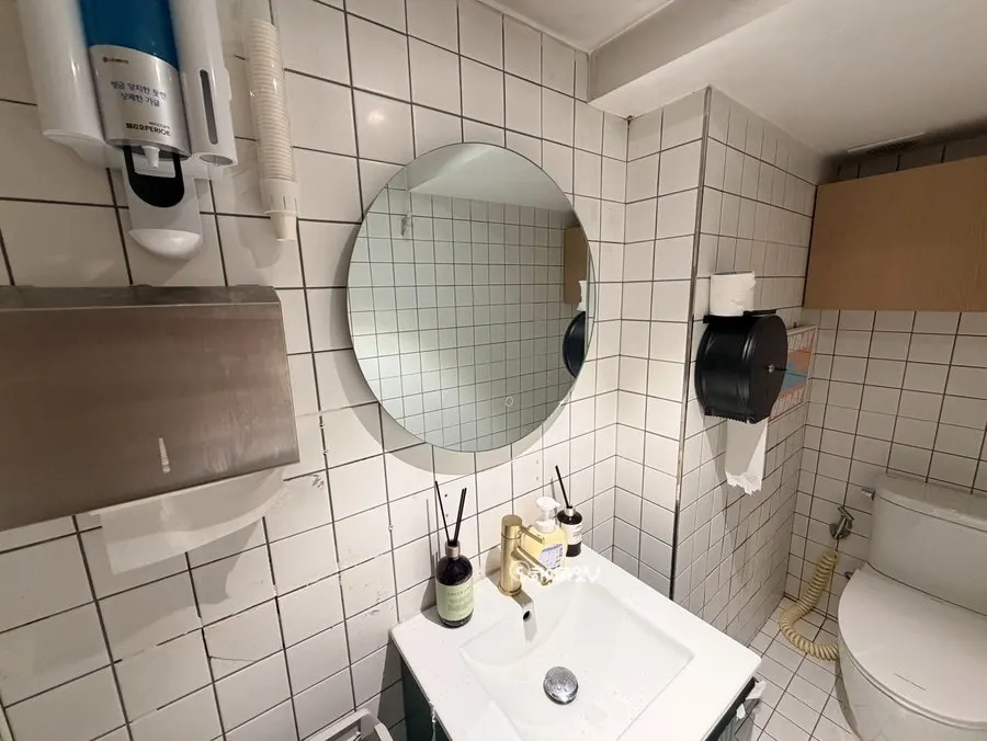 Restroom inside Omil stocked with mouthwash
