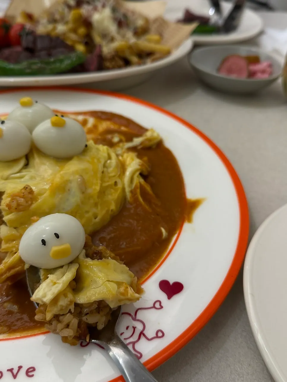 Chit-chit-chit! Rubber Duck Omurice topped with a rubber duck and tube