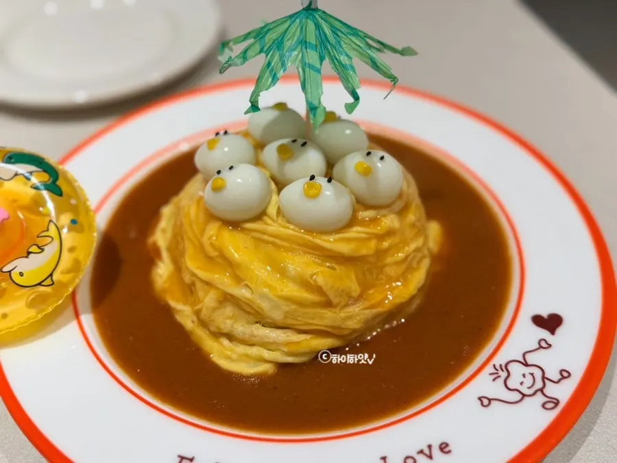 Fried rice and special sauce inside the omurice