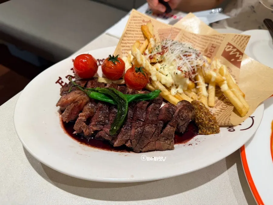 Omil Steak served on a plate