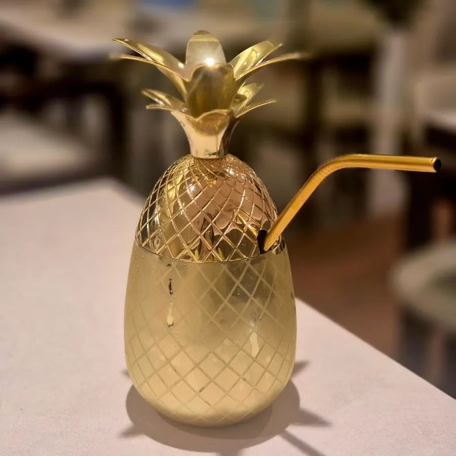 Pineapple ade served in a hollowed-out pineapple