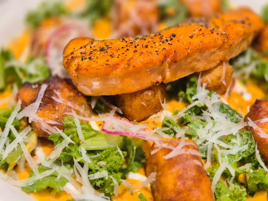 Salmon steak gnocchi topped with rose sauce