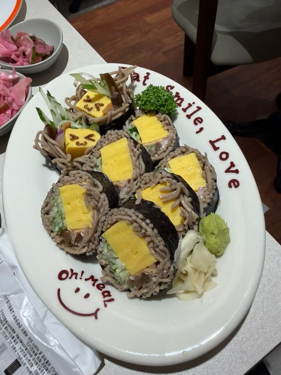 A piece of katsu resting on grilled onions