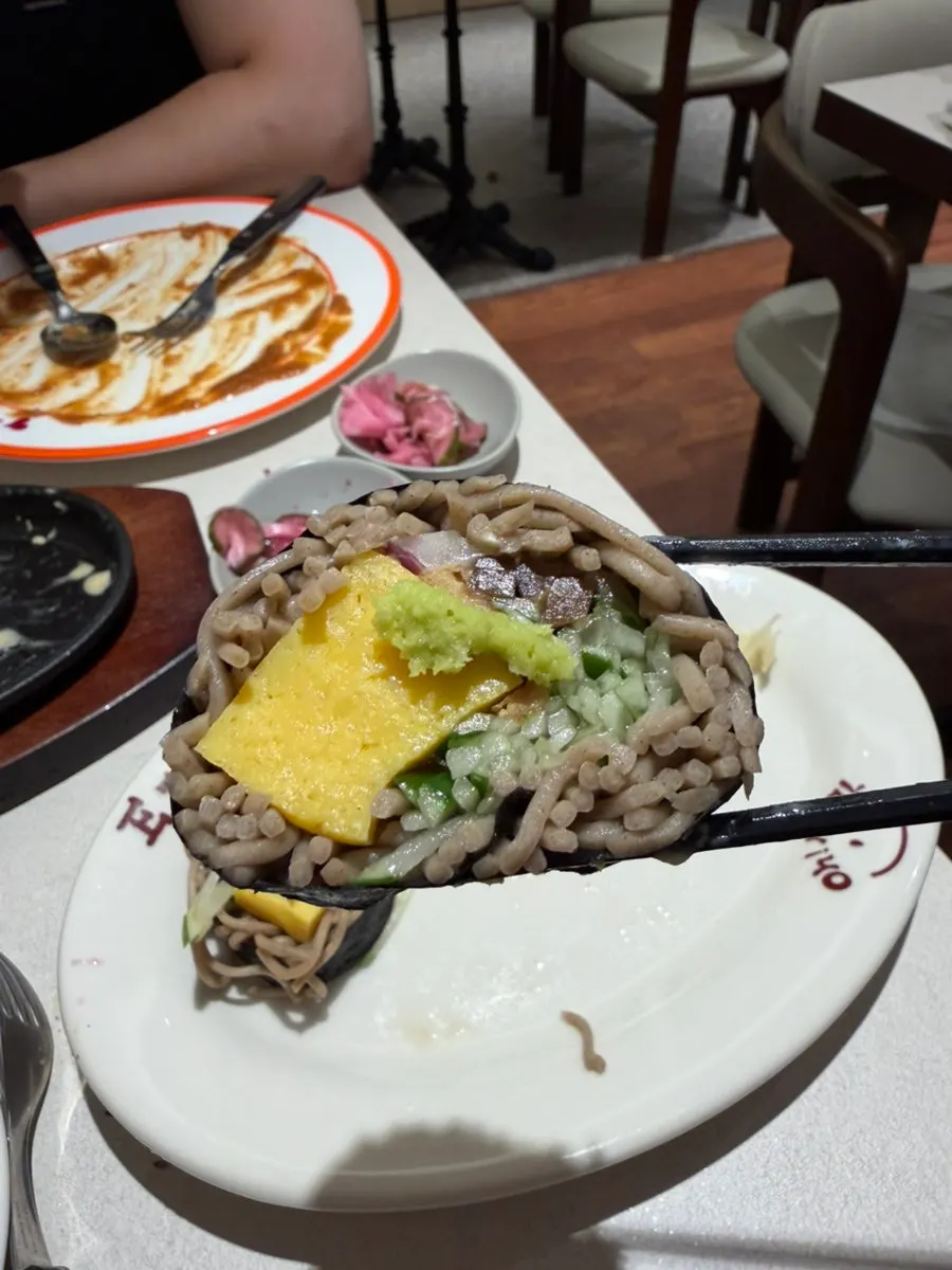 Buckwheat noodle soba maki topped with wasabi