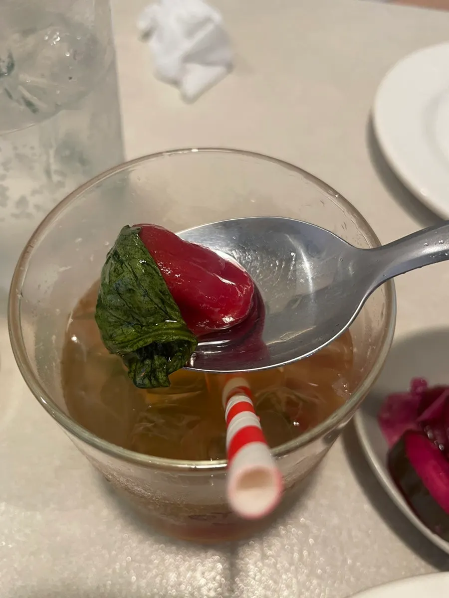 Basil tomato ade served alongside the meal