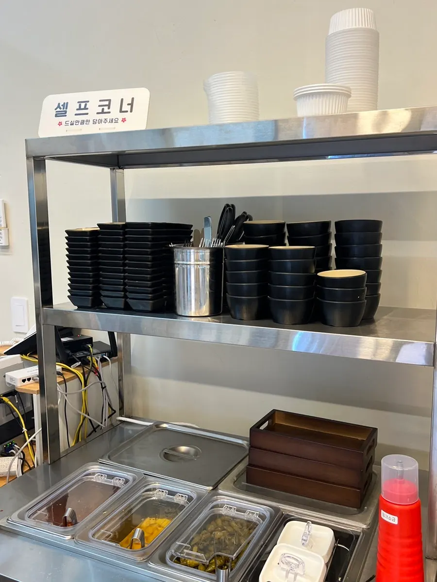 Self-serve bar with side dishes at Omi Katsu