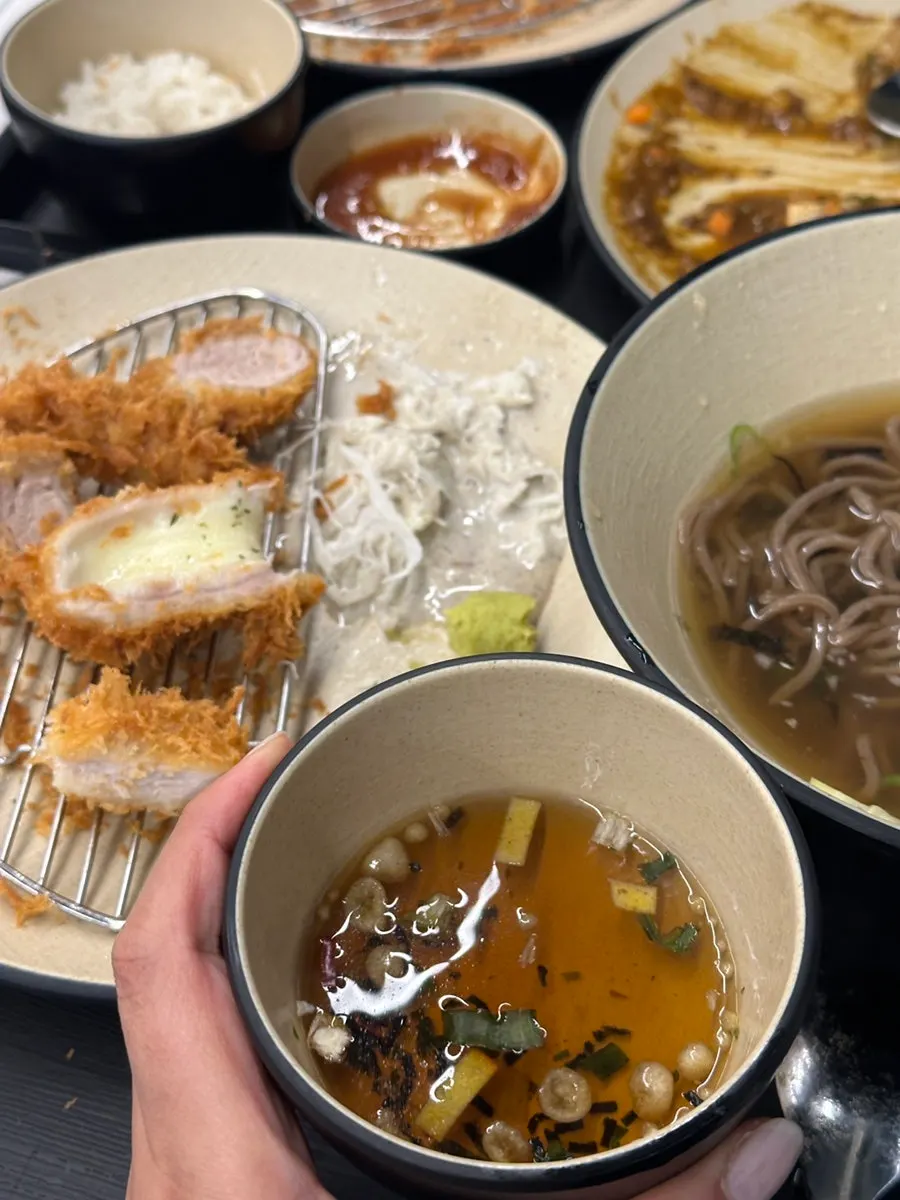 Eating curry and tonkatsu together