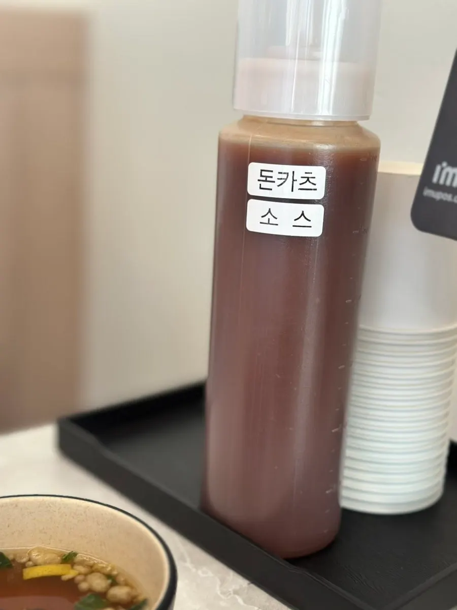 Broth, kimchi, and pickled radish from the self-serve corner
